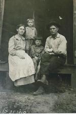 Jessie Montgomery Davis w/ brother and sons, Ralph-standing, Fred, sitting.